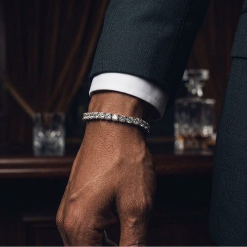 The Bracelet worn on the wrist with a suit